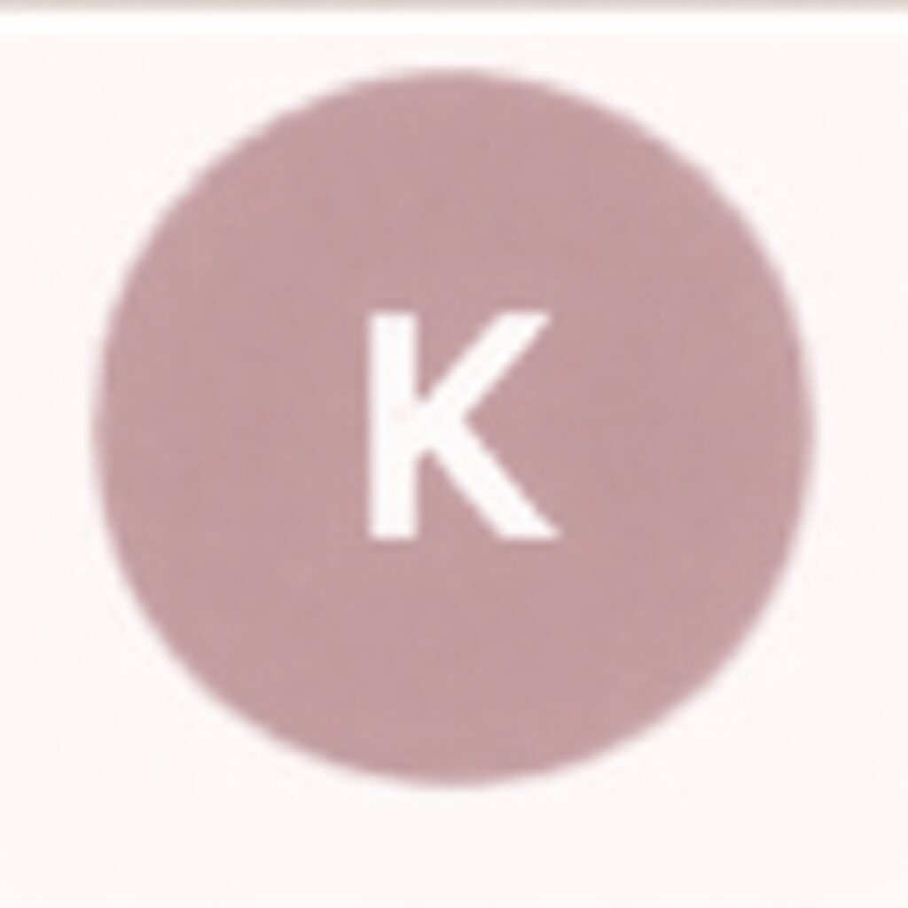 Letter "K" inside a pink circle.
